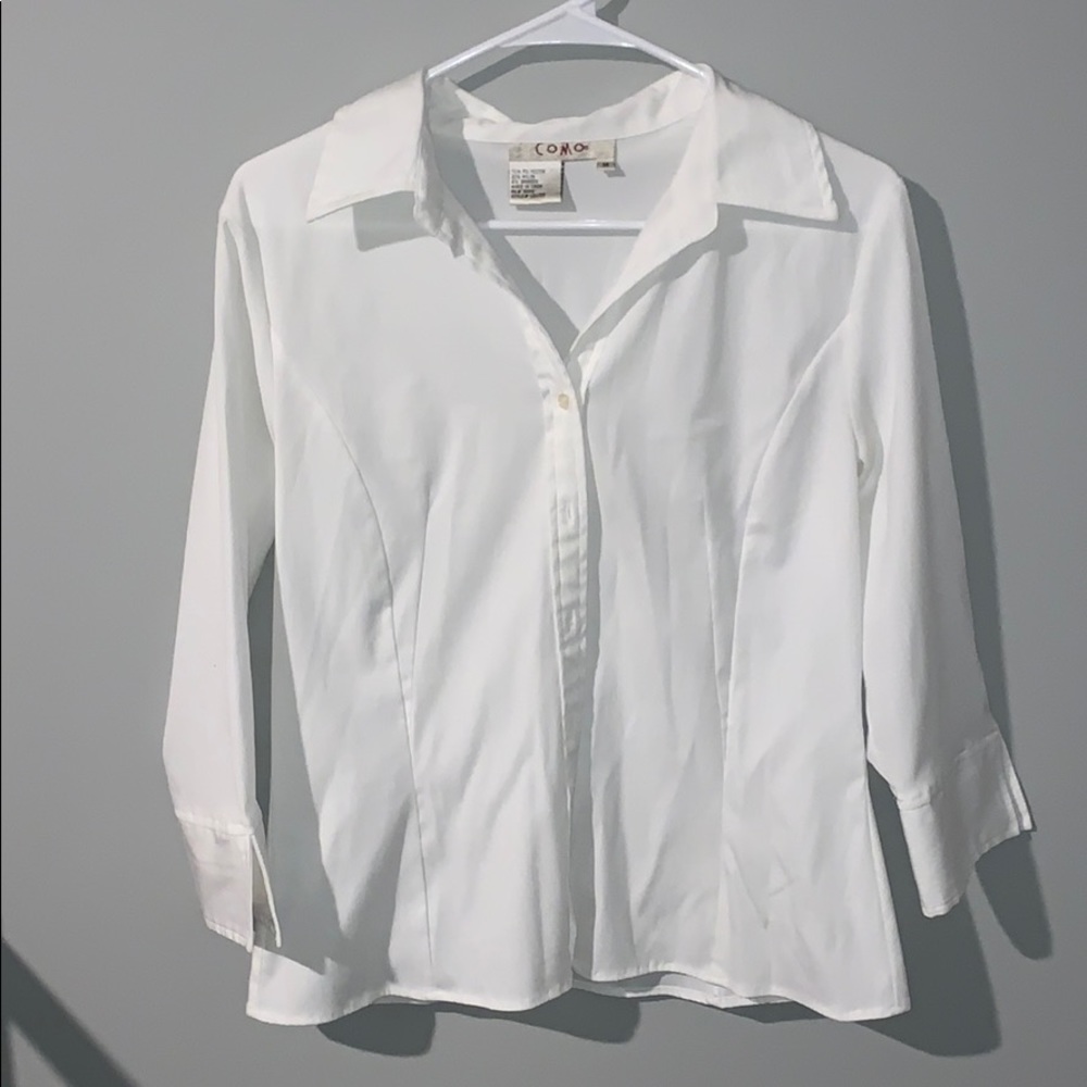 White button up blouse.